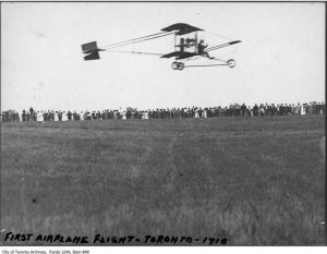 Plane taking off 1910 w. printed text